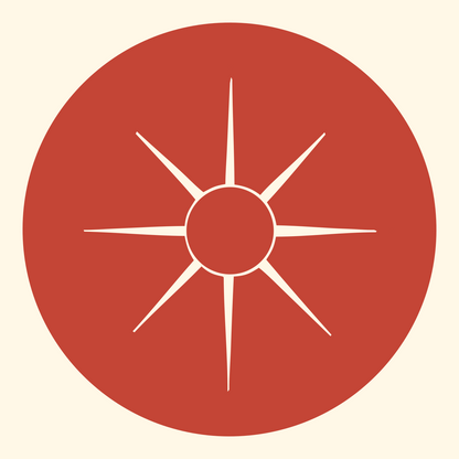 Negative Space Sun Compass Badge #fff8e7/#c44536