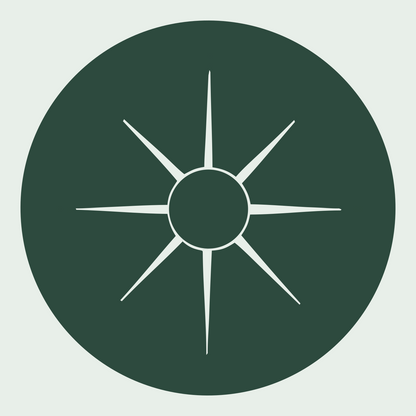 Negative Space Sun Compass Badge #e8efe9/#2d4a3e