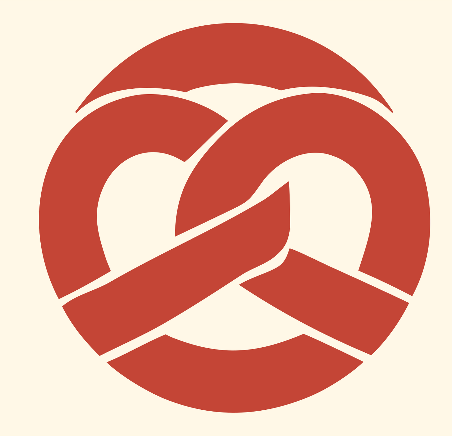 Negative Space Pretzel Circle Badge #fff8e7/#c44536